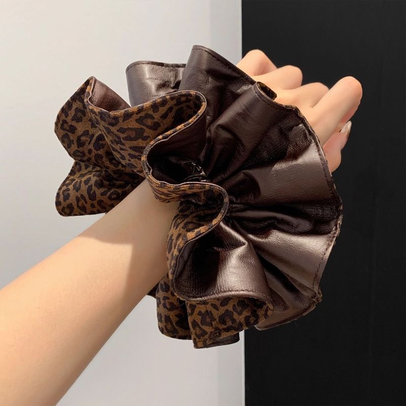1pc 韓国風ブラウンヒョウ柄レザーハイエンド女性用お団子ヘ - Leatherwork Pony のレビューと価格